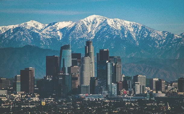 Los Angeles skyline and San Gabriel mountains.